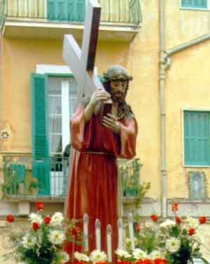 JESUS BURDENED BY THE CROSS